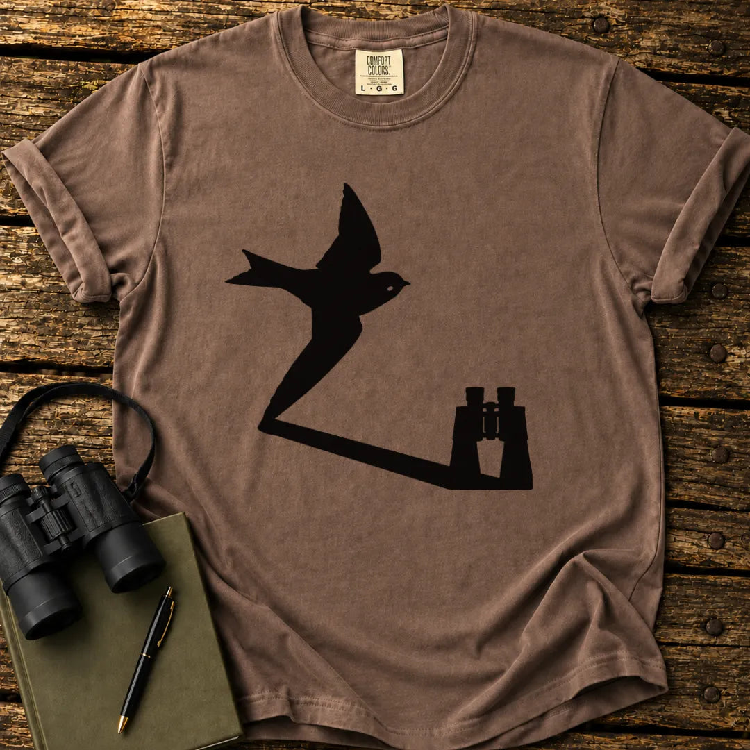 Illustrated Swallow viewed through binoculars on a graphic t-shirt