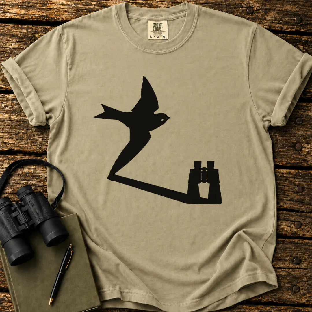 Illustrated Swallow viewed through binoculars on a graphic t-shirt