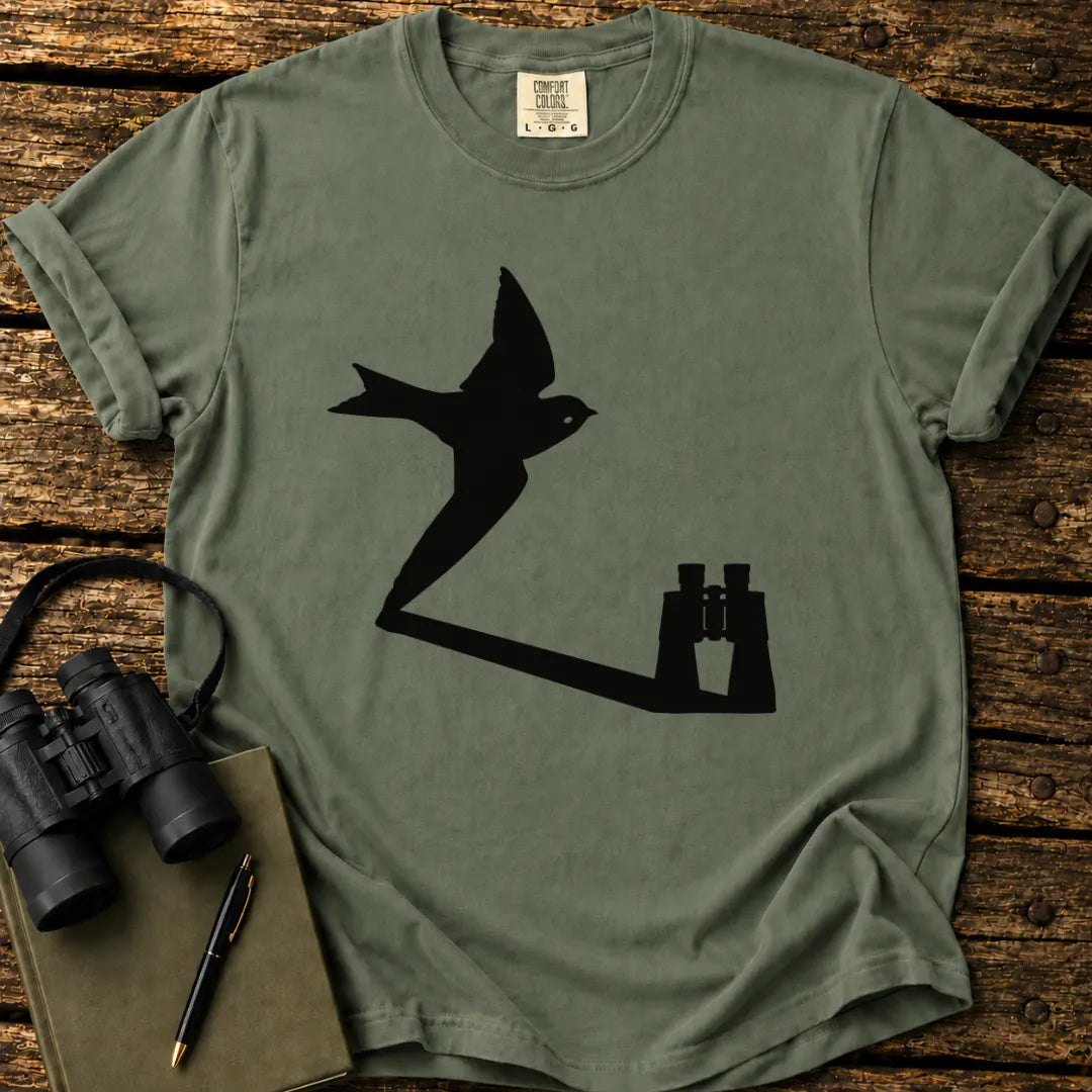 Illustrated Swallow viewed through binoculars on a graphic t-shirt