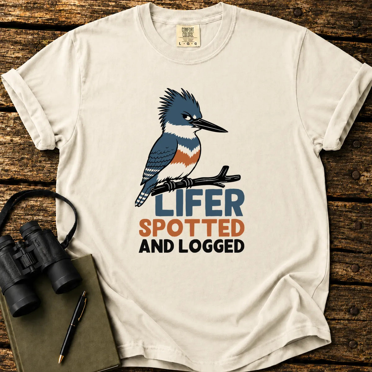 Illustrated Belted Kingfisher design on a retro-style birdwatching t-shirt