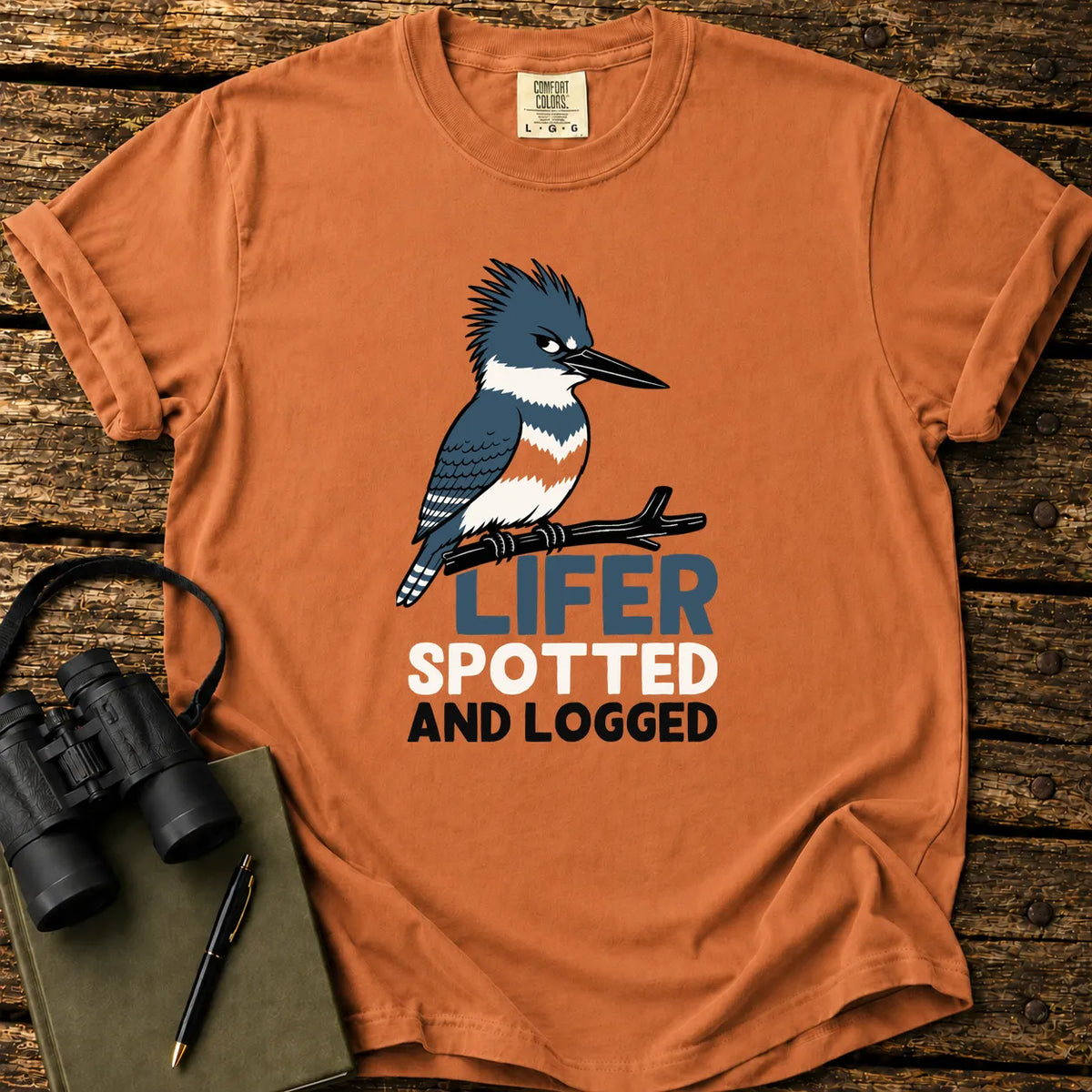Illustrated Belted Kingfisher design on a retro-style birdwatching t-shirt
